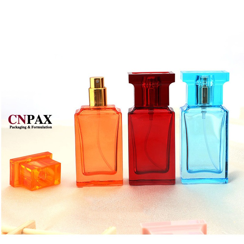 square glass bottle with gold mist sprayer