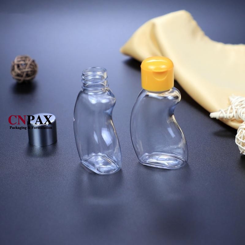 bean shaped plastic bottle container with flip top cap